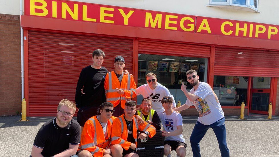 People outside Binley Mega Chippy