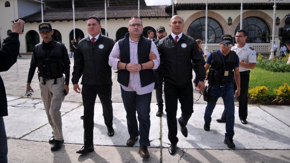 Javier Duarte (C), former governor of the Mexican state of Veracruz, is escorted by police after arriving to the Air Force compound for his extradition to Mexico, in Guatemala City, Guatemala, 17 July 17