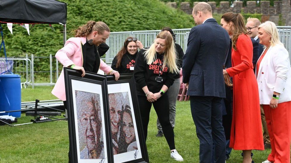 The then Duke and Duchess of Cambridge are shown two collages by artist Nathan Wyburn depicting them and the Queen as they visit Cardiff Castle on 4 June 2022