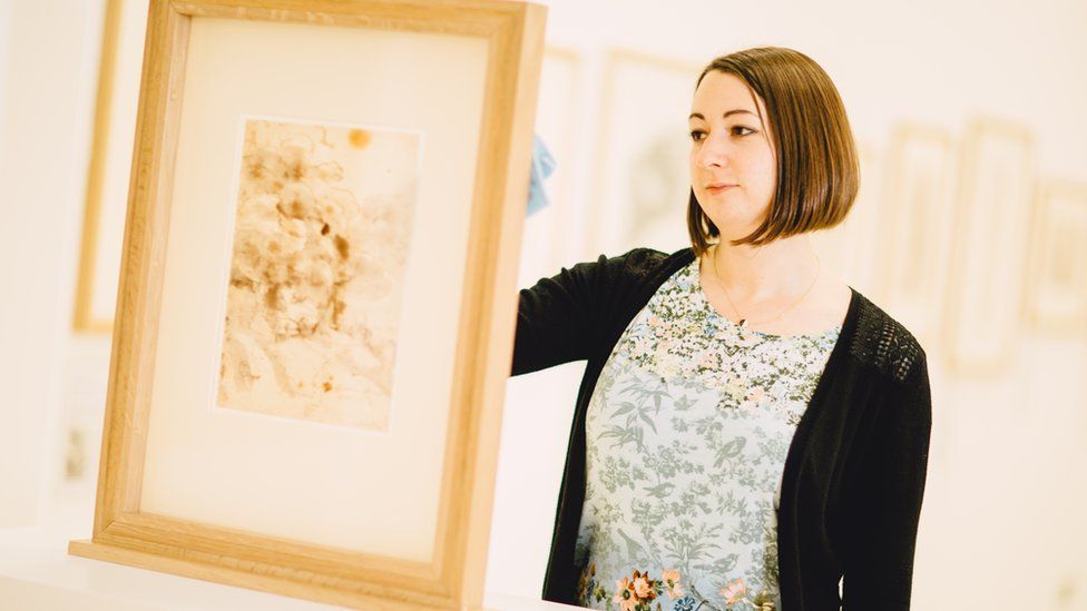 Helen Pickles, Assistant Collections Manager, Loans and Display, British Museum prepares a Claude Lorrain drawing