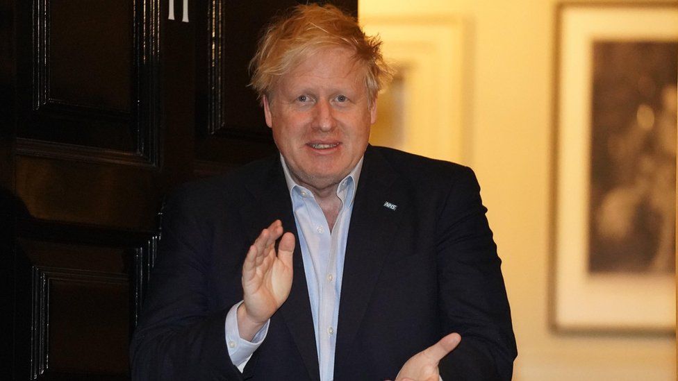 Boris Johnson clapping for carers