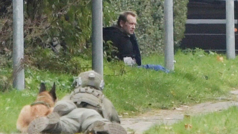 Peter Madsen is seen surrounded by police in Albertslund, Denmark October 20, 2020