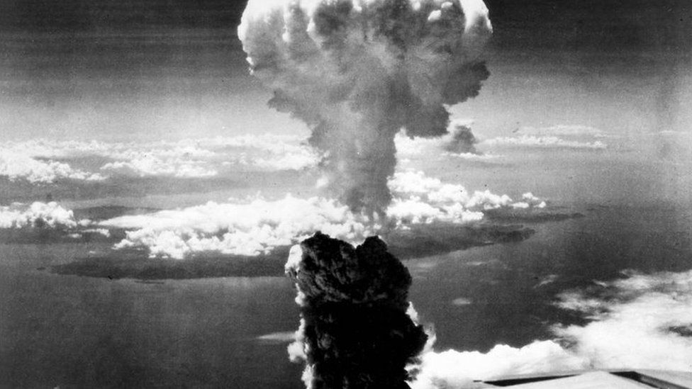 Smoke billows up over Nagasaki, Japan, after bombing by atomic bomb on 9 August 1945