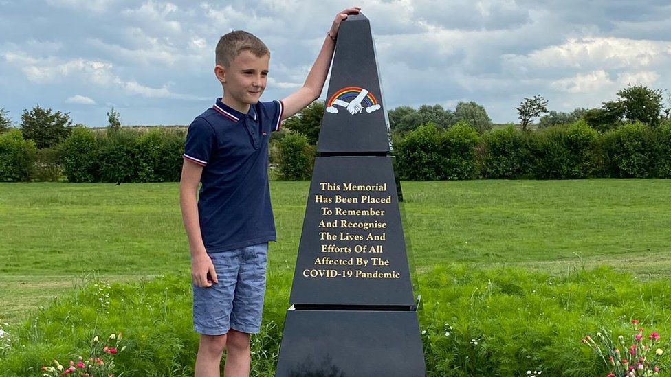 Jake with his Covid-19 memorial obelisk