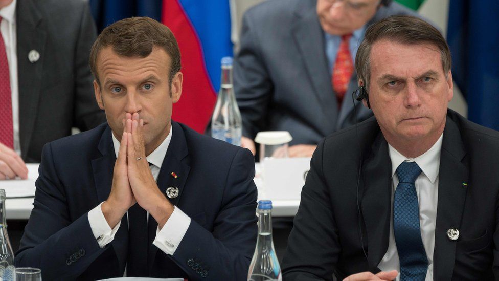 Emmanuel Macron (L) and Jair Bolsonaro at the G20 Summit in Osaka, 28 June