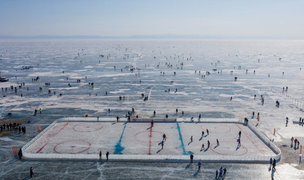 An aerial view shows a hockey rink after a match on the ice of Lake Baikal, near Bolshoye Goloustnoye in Irkutsk region, Russia, 8 March 2021.