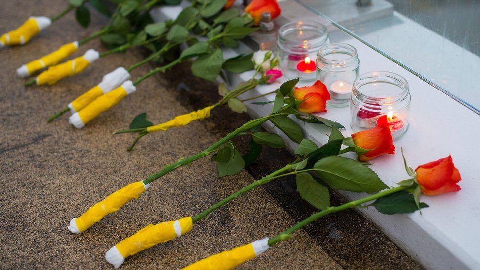 Flowers laid on the Shoreham toll bridge near the crash site