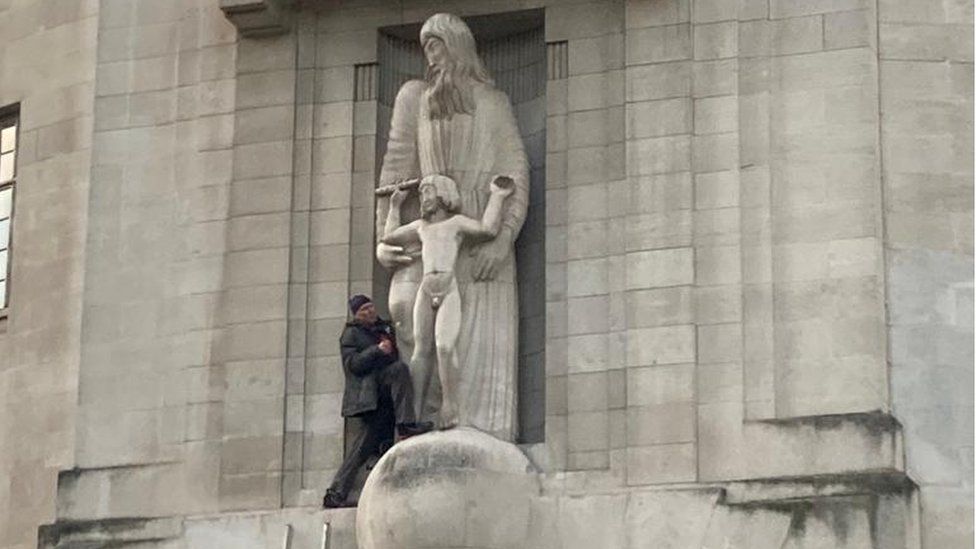 A man attacks the Prospero and Ariel statue outside Broadcasting House