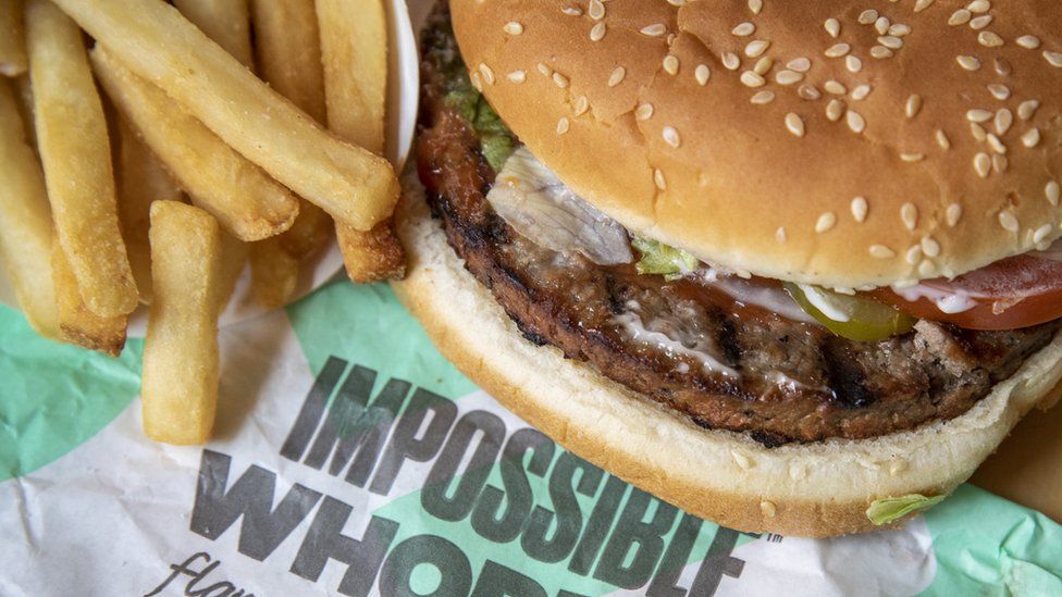 A close-up of the Impossible Whopper and fries