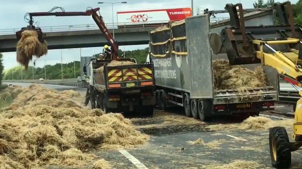 Straw being cleared after fire