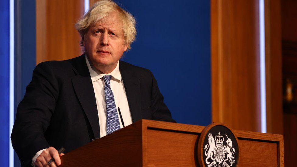 Prime Minister Boris Johnson gives a press conference at 10 Downing Street on 8 December 2021.