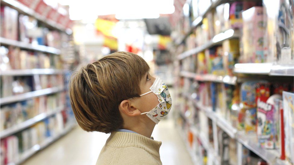 Kid in a toy store