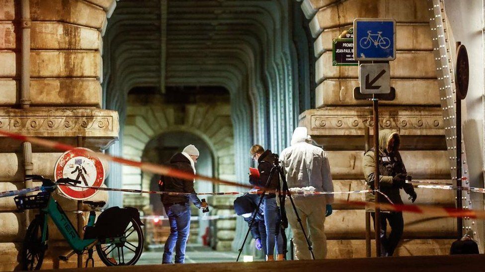 French forensic policemen investigate the scene