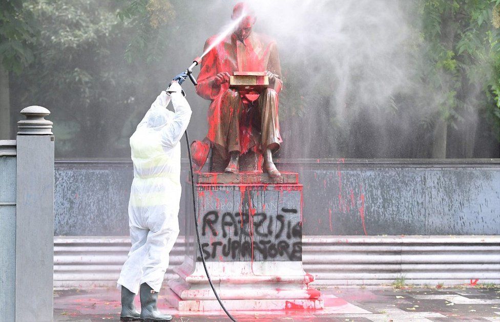 Vandalised statue of Indro Montanelli being cleaned up in Milan, 14 Jun 20