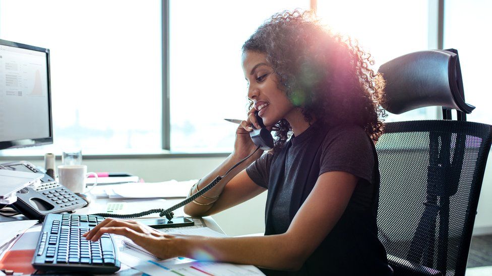 Woman on the telephone at work