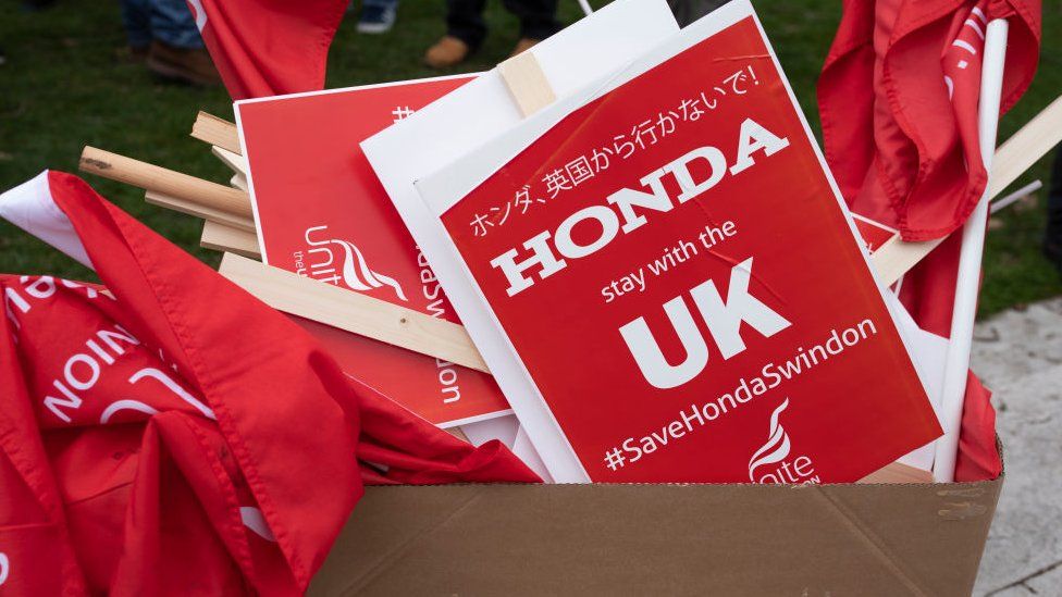 Honda placards after a protest against the plant's closure