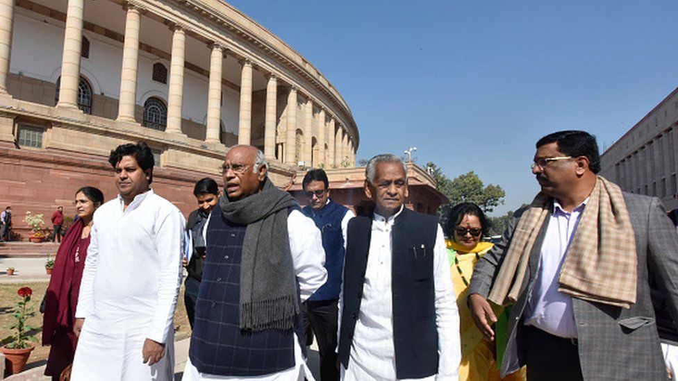 Leader of the Opposition in Rajya Sabha Mallikarjun Kharge along with other Opposition parties leaders walk out after both houses of the parliament adjourned on Adani issue during the ongoing Parliament Budget session