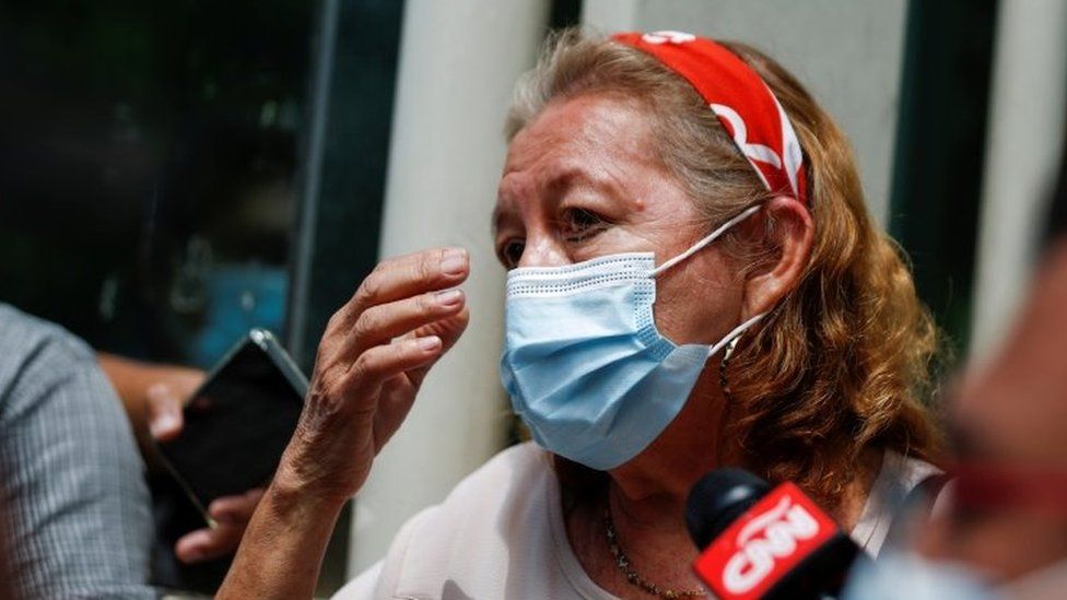 Rosibel Emerita Arriaza, mother of Victoria Salazar Arriaza, a Salvadoran woman who died in Mexican police custody, speaks with the media outside the Ministry of Foreign Affairs in San Salvador, El Salvador March 29, 2021.