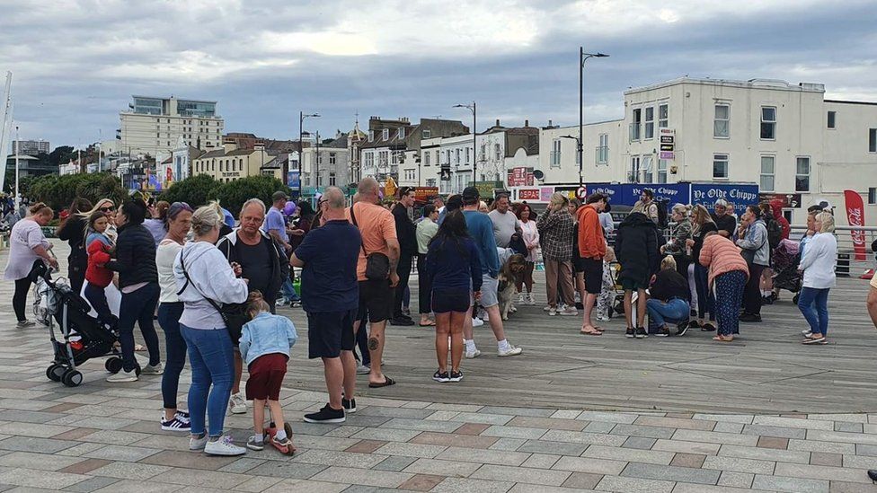 People attending a vigil for Archie Battersbee