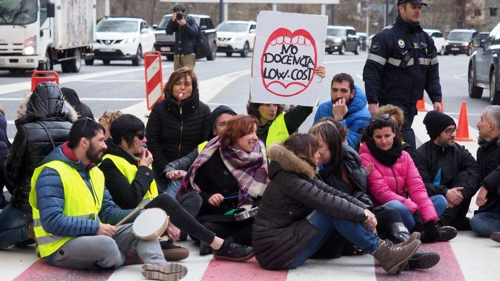 Employees of the Andorran public service, demonstrate and block the Spanish-Andorran border at Sant Julia de Loria on March 16, 2018. The tiny principality of Andorra is witnessing a once in a generation phenomenon -- a widespread strike. Around a third of civil servants across the mountainous micro-state have walked out to protest proposed reforms to their sector in what has been described as Andorra's first large-scale strike since 1933