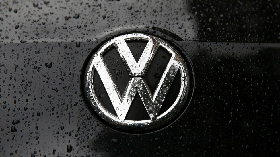 Raindrops are seen on the badge of a diesel Volkswagen Passat in central London