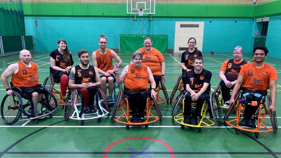 Terry Dennis with his basketball team