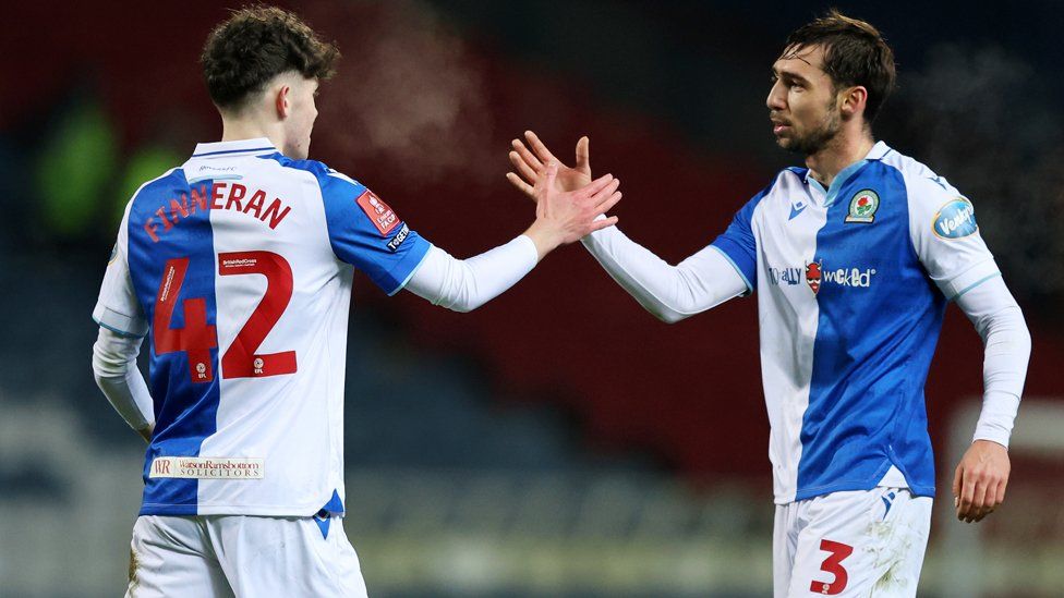 Blackburn Rovers record-breaker makes debut in logo-free shirt - BBC News