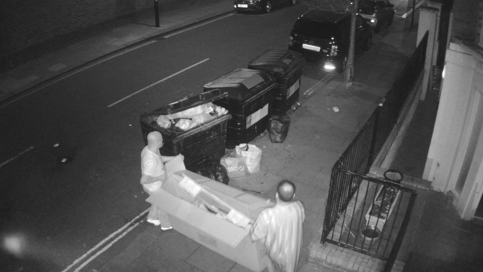 Black and white CCTV footage of fly tipping in Westminster