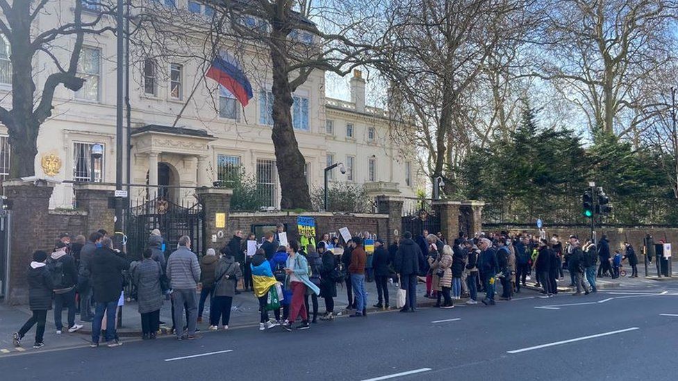 More than 100 people are outside the Russian Embassy