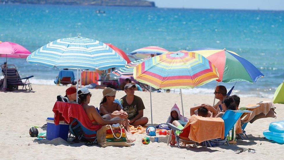 Tourists on a beach in Majorca, 21 Jun 20
