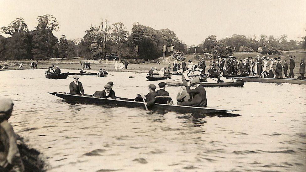 Boaters on the rowing lake at Wicksteed Park, Kettering