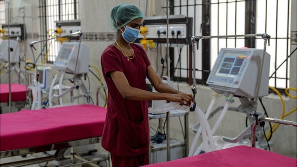 A medical staff checks on a ventilator at a newly inaugurated hospital by the Tamil Nadu state to fight COVID-19 coronavirus, in Chennai on March 27, 2020
