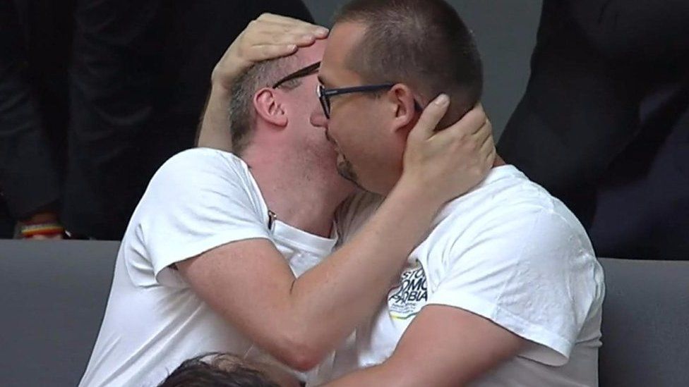 A gay couple celebrates vote