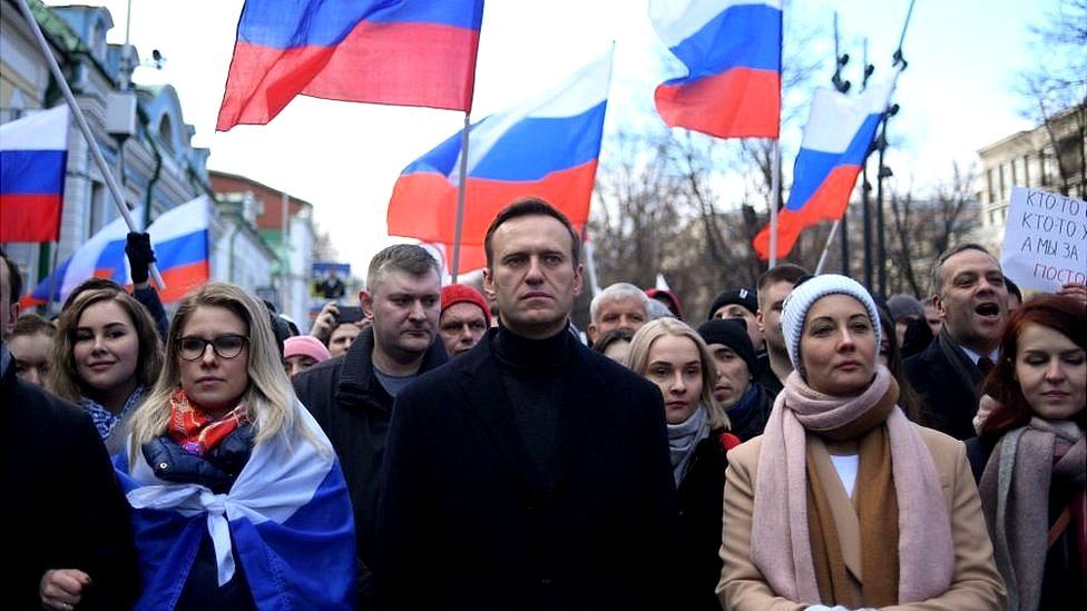 Russian opposition leader Alexei Navalny, his wife Yulia, opposition politician Lyubov Sobol and other demonstrators march in memory of murdered Kremlin critic Boris Nemtsov in downtown Moscow on 29 February 2020