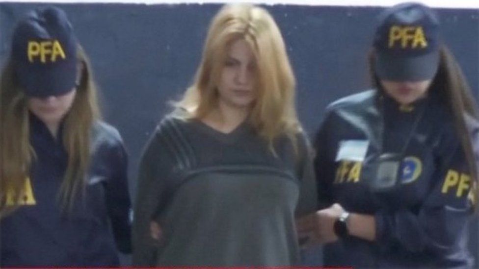 A screen grab from a video shows Brenda Uliarte, girlfriend of Fernando Andres Sabag Montiel, while she is being detained by police, in Buenos Aires, Argentina September 4, 2022.