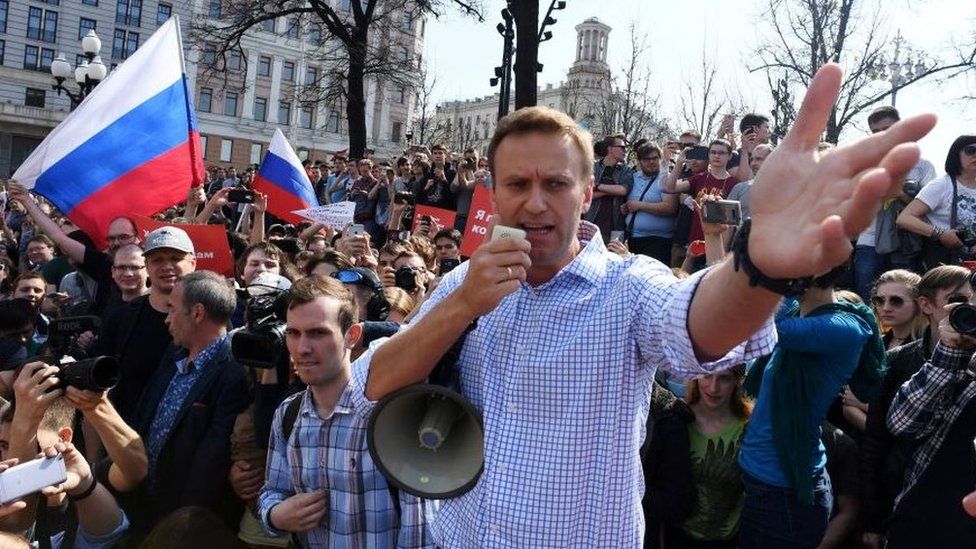 Russian opposition leader Alexei Navalny addresses supporters during an unauthorized anti-Putin rally on May 5, 2018