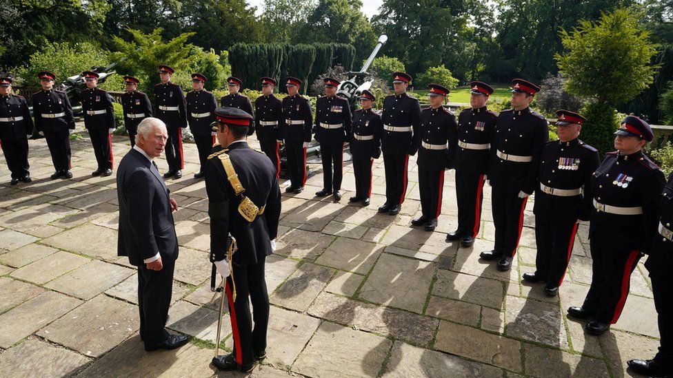 King Charles meets soldiers who carried out a gun salute at Hillsborough Castle