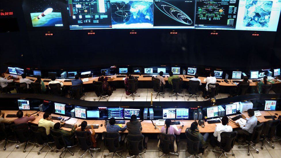Indian scientists and engineers of Indian Space Research Organization (ISRO) monitor the Mars Orbiter Mission (MOM) at the tracking centre in 2013.