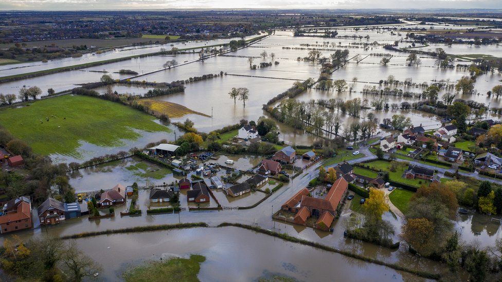 An aerial image of flooding in the village of Fishlake