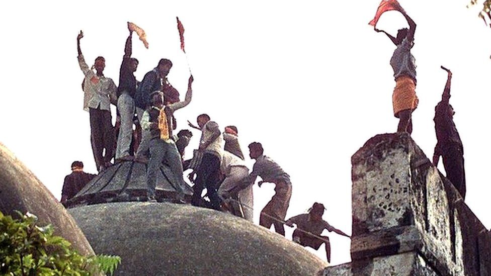 Right-wing Hindu youths atop the Babri Mosque on 6 December, 1992, hours before it was demolished by hundreds.