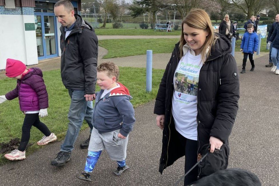 Huthwaite Charity walk for boy who lost legs after sepsis BBC News