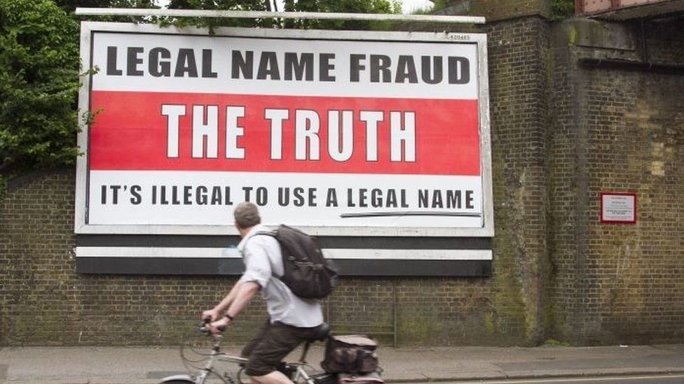 "Legal name fraud" poster in London