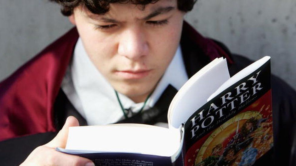 A Harry Potter fan reading the final instalment of the Harry Potter series in Sydney