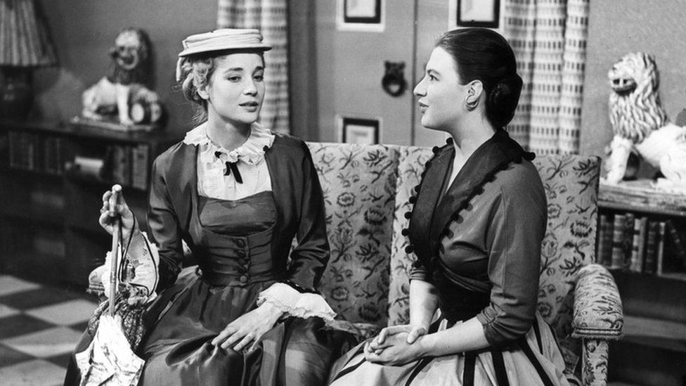 Sylvia Syms as Rosario and Olivia Irving as Irene. in The Romantic Young Lady
