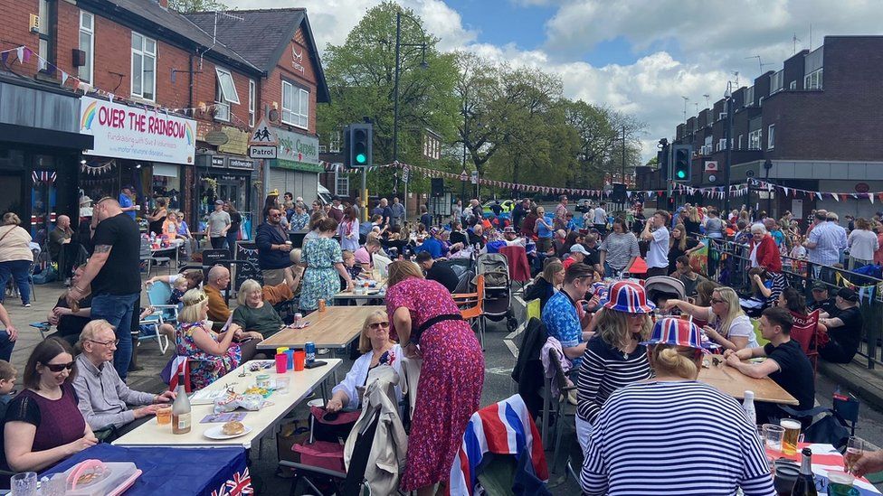 Rows of people at the street party