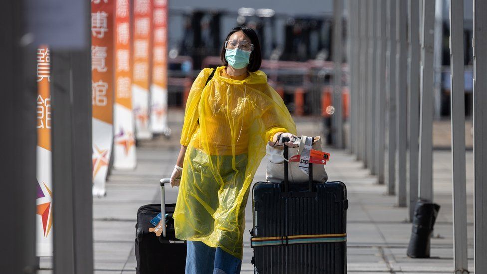 An air passenger wearing protective equipment in Hong Kong, China