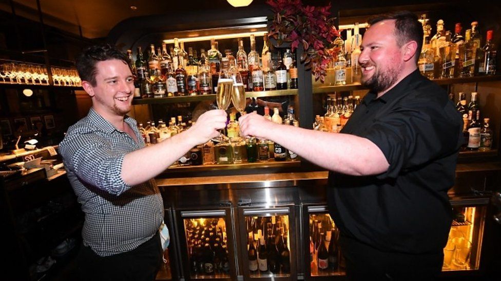 Two men in a bar