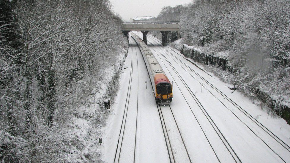 Snow covered tracks near Surbiton Station