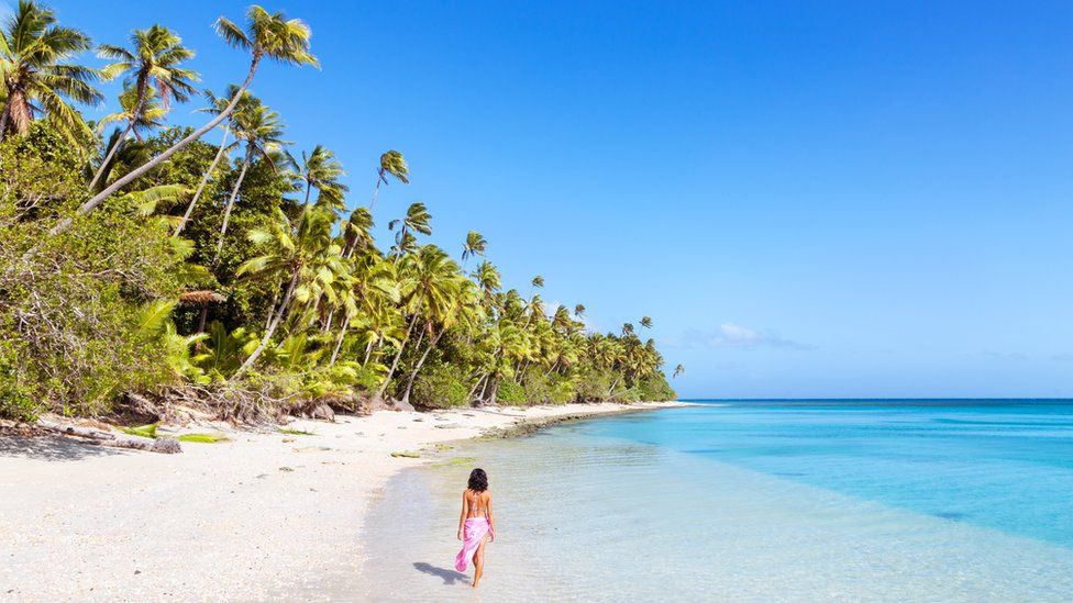 A tourist on a Fijian beach