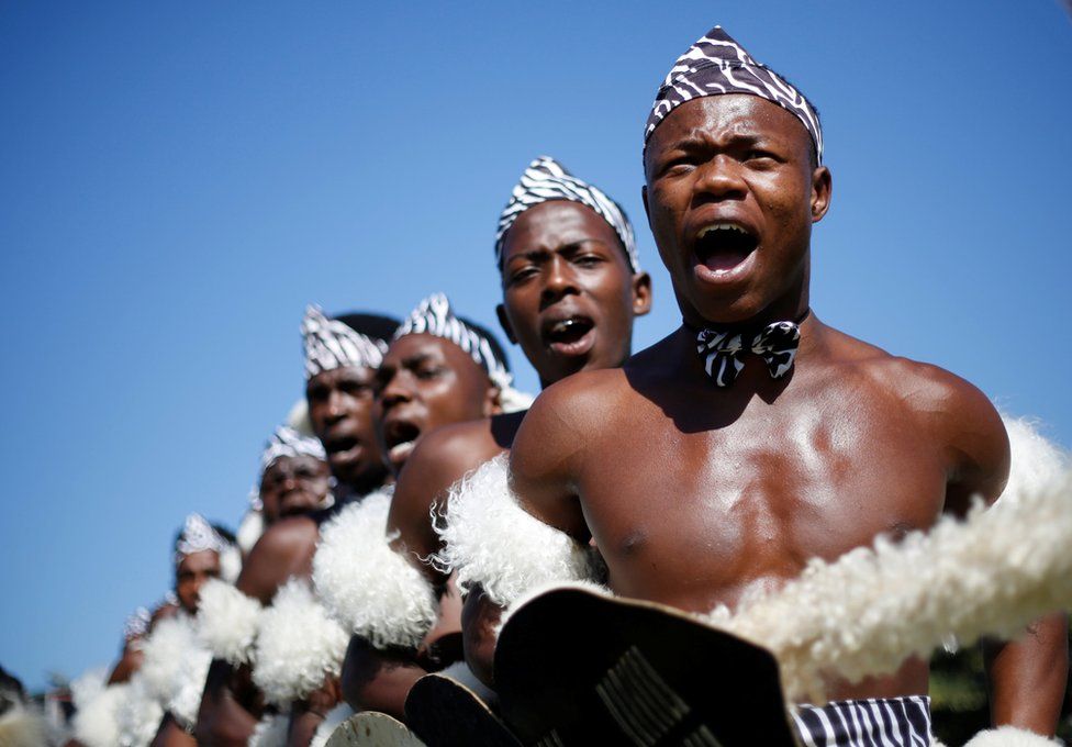 Contestants sing as they begin their routine during the annual Ingoma traditional Zulu dance competition in Durban